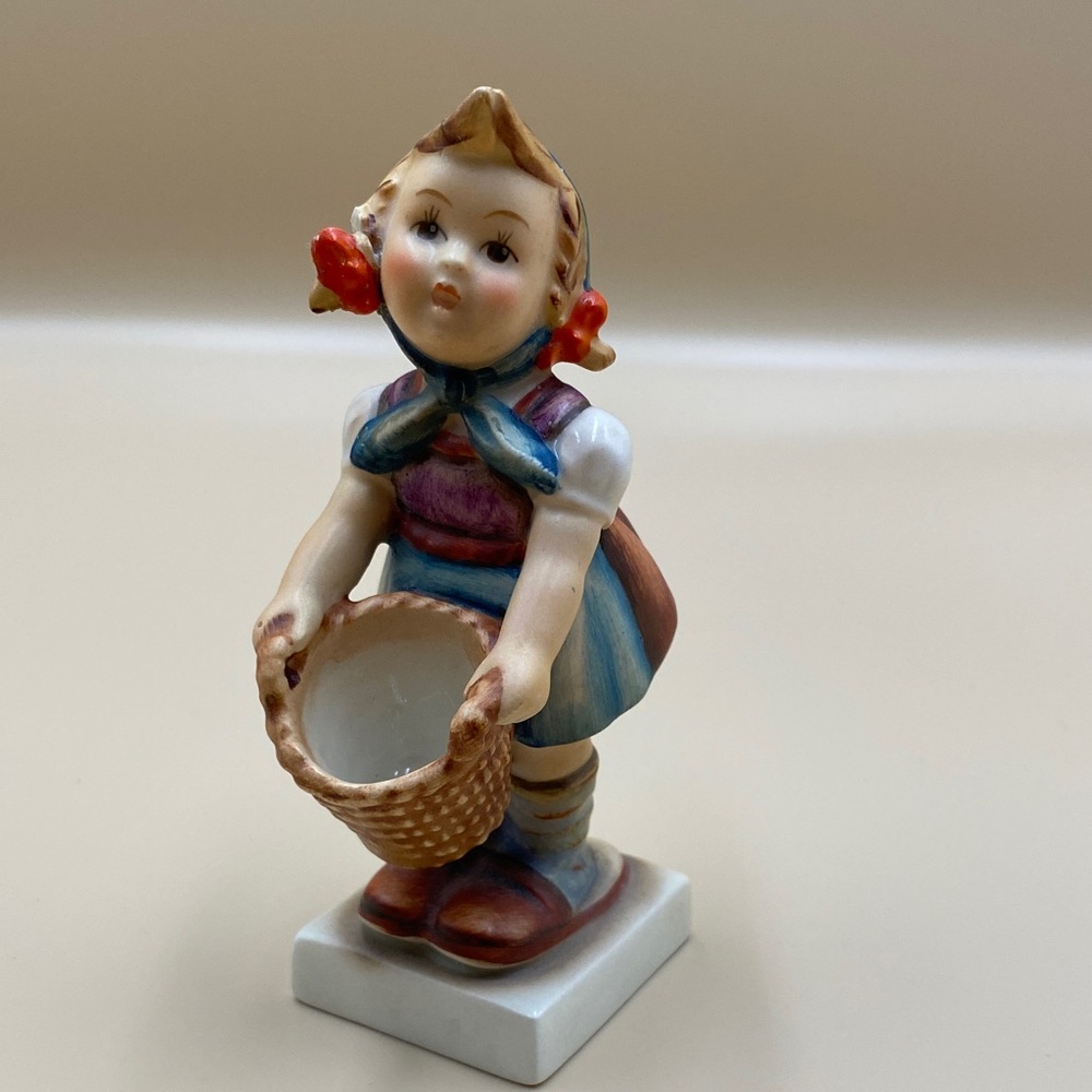 Porcelain Girl Figurine Holding Basket - Handpainted M.J. Hummel western Germany